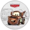 „Tow Mater“ je tretím vydaním série mincí „Autá“ spoločnosti Disney Pixar. Na striebornej minci 1 oz je farebný obrázok Matera, najzhrdzavenejšieho a najspoľahlivejšieho ťažného vozidla v chladičových kúpeľoch, s kúpeľmi na pozadí.