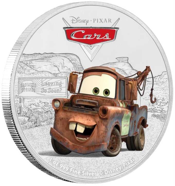 „Tow Mater“ je tretím vydaním série mincí „Autá“ spoločnosti Disney Pixar. Na striebornej minci 1 oz je farebný obrázok Matera, najzhrdzavenejšieho a najspoľahlivejšieho ťažného vozidla v chladičových kúpeľoch, s kúpeľmi na pozadí.