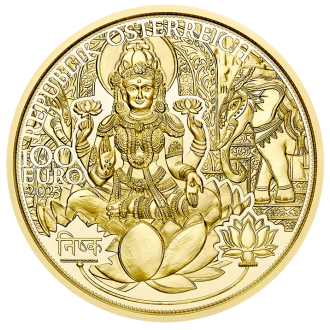 Piata minca zo série The Magic of Gold vám umožní ponoriť sa do fascinujúcich mýtov a dávnych tradícií krajiny, ktorá má hlboké spojenie so zlatom. Zlato Indie obsahuje dve mimoriadne charizmatické božstvá z mýtov starovekej Indie – Lakšmí a Krišnu.
Lakshmi je hinduistická bohyňa šťastia a prosperity. Tretí deň Diwali, festivalu svetiel, je venovaný jej. Zlaté a pozlátené mince predstavujúce Lakšmí uctievajú hinduistické rodiny v domácich svätyniach pre šťastie. Legenda hovorí, že Lakshmi sedela v lotosovom kvete a vybrala si za manžela Višnua. Krišna je jednou z najslávnejších inkarnácií Višnua, jedného z hlavných božstiev brahmanizmu. Krišna znamená „ten, kto ťa k sebe priťahuje“. Stal sa symbolom najvyššieho aspektu ľudského vedomia a vzťahov: medzi synmi je najlepším synom, medzi priateľmi je najlepším priateľom, medzi milencami je najlepším milencom, medzi tými, ktorí pomáhajú hľadajúcim nájsť správnu cestu, je najlepší sprievodca.
Na rube mince je zobrazený Krišna sediaci v „lalitasane“, čiže kráľovskej pozícii, oslňujúci tými najlepšími šperkami a obklopený ozdobným pásom pripomínajúcim pávie pierka. 
Na lícnej strane mince je zobrazená Lakšmí sediaca v lotosovom kvete po stranách slonov. Dve z jej štyroch rúk držia lotosové kvety, zatiaľ čo ďalšie dve nám ponúkajú zlaté mince. Pod ňou je nápis Nishka, sanskrtské slovo, ktoré znamená „malý zlatý kotúč na peňažné účely“.
Séria “mágia zlata“ sa dokonale hodí k božstvám, ktoré osídľujú a obohacujú indickú predstavivosť a kultúru, pretože tak ako Krišna a Lakšmí znamenajú prejav najvyššieho, tak aj zlato, z ktorého je vyrobená táto nádherná minca.